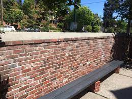 Whether your project is big or small, we can assist you with your stone needs. Our Beautiful Brick Wall And Steepled Cement Top Mimics The Construction Materials Of The House With Steep Angle Of Our Traditi House Front Brick Wall Backyard