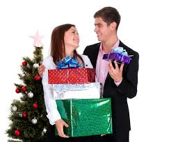 We've provided you with whether you're shopping for your boyfriend, husband, father or son, this list of christmas gifts for men includes everything from ethically conscious clothing. Young Man Giving A Gift A Girl In Christmas Stock Photo Image Of Women Santa 35150948