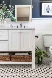 A few of these rooms have beautiful flowered wallpaper, another popular feature of the country cottage home. 5 Things Your Modern Cottage Bathroom Needs A Pop Of Pretty Modern Cottage Bathrooms Black And White Bathroom Floor White Bathroom Tiles
