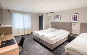 Hotel Cult Dreibettzimmer