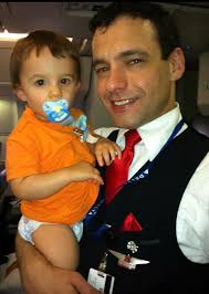 Once upon a time, a little 🤴🏼 was tired but didn't want to nap. A 🧚‍♀️  flight attendant gently rocked him to sleep 😴 and the passengers flew  happily ever after. Thank