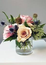 Showcase your flower arrangement with the right flower vase or plant pots that match your home decor. Dusty Blush Small Centerpiece The Flower Alley