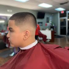 A skin fade once again does what it says on the tin. High Mid Bald Fade With An Edge Up For Lil Man Barber