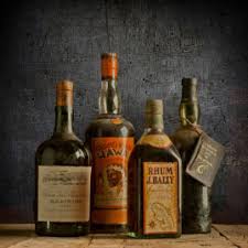 American badge with calligraphic elements. Old Liquors Florida Distributor Of Rare Vintage Cognac More