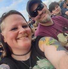 Which is better for carrying Magic: The Gathering mats and decks, a  backpack or a hand held bag?