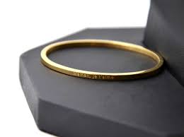 Accueil / accessoires / bijoux / bracelet je t'aime. Bc2470f Bracelet Jonc Fin Acier Dore Avec Message Maman Je T Aime Oh My Shop