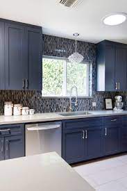 I had new quartz kitchen counters installed yesterday. Blue Midcentury Modern Kitchen With Pental Quartz Backsplash Hgtv