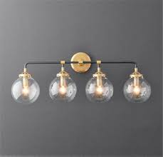 Add an edison style bulb for a more transitional look or an 'a' type led for a more contemporary feel. A Touch Of Design 4 Light Glass Globe Dimmable Vanity Light Black And Gold Ashley Furniture Homestore Brass Vanity Light Bathroom Lighting Black And Gold Bathroom