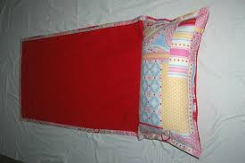 Awakened beautiful young woman in elegant nightie lying on white bedding and smiling. Beach Blanket With Pillow Included