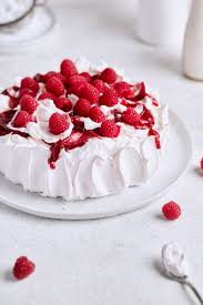 Don't worry about a perfectly flat disc. Classic Raspberry Pavlova Tutti Dolci