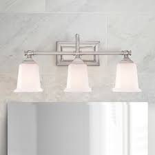 Satin nickel finish over add one to each side of a bathroom mirror on the vertical, or hang horizontally above the mirror. Modern Bathroom Light Fixtures Destination Lighting