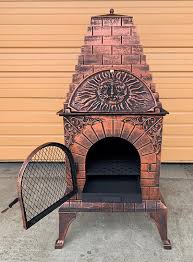 This chiminea can also serve as a grill and oven. Deeco Aztec Allure Cast Iron Chiminea Pizza Oven Dm 0039 Ia C