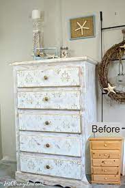 Worn patinas and white furniture create a gorgeous example of the popular style flowing fabrics worn patinas and white furniture create a wonderful space. White And Gold Distressed Damask Dresser Shabby Chic Furniture White And Gold Dresser Diy Furniture Projects