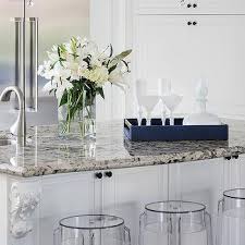 White granite is harder to find than black or brown granite. White Kitchen Cabinets With Tan Granite Countertops Design Ideas