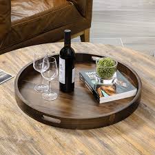 These wonderful and versatile round storage ottoman coffee tables are not just a great furniture piece, but also a stylish place to put things that aren't commonly used in the living room, like a blanket for some cold night snuggling, or additional. Buy Kingcraft 24 X 24 Inches Large Round Ottoman Table Tray Wooden Solid Circle Serving Tray With Handle Black Walnut Platter Decorative Tray For Oversized Ottoman Home Breakfast In Bed Tea Coffee