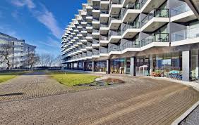 The property has recently undergone extensive renovations that include new energy efficient windows, new exterior paint, new landscaping, and new entryway. Sea View Seaside Park North Apartments Apartment Kolobrzeg