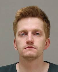 Suspect's parents charged in Grand Rapids dismemberment case