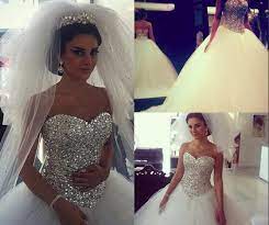 Das hochzeitskleid ist für jede frau etwas ganz. Grosshandel Funkelnde Brautkleider Ballkleid Puffy White Mit Kristallen Strasssteine Tull Arabische Brautkleider Echtes Bild Flauschiges Kleid Fur Braut Von Yateweddingdress 126 05 Auf De Dhgate Com Dhgate