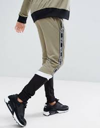 432,410 likes · 12,308 talking about this · 141 were here. Boohooman Joggers With Block Detail In Khaki Multi Mens Jogger Pants Mens Outfits Khaki Fashion