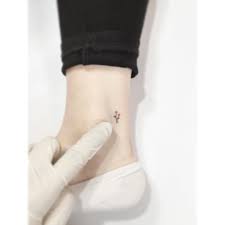 50 Tiny Rose Tattoos To Feed Your Beauty And The Beast Obsession Tiny Rose Tattoos Small Rose Tattoo Tattoos