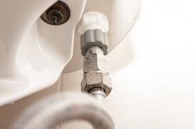 To turn a gate valve on or off, a circular handle is turned to raise or lower a metal gate inside the valve body. How To Replace A Toilet Shut Off Valve Bob Vila