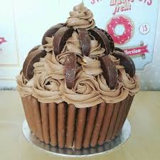 Birthday Cake Recipe Ideas Uk Found On Bing From Www Partyanimalonline Co Uk Giant Cupcake Recipes Giant Cupcake Cakes Cupcake Cakes