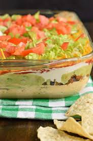 The Ultimate 7 Layer Dip Recipe Is Packed With Layers Of Cream Cheese Sour Cream Ground Beef And Or Beans Layered Dip Recipes Dip Recipes 7 Layer Dip Recipe