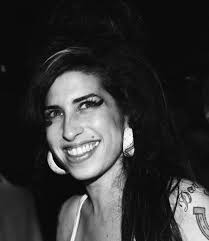 I miss Amy a lot tonight, here are some lovely photos : r/amywinehouse