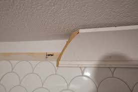 How to fix gaps around tub and shower surrounds Crown Molding For Beginners How To Install Over Tile Love Create Celebrate