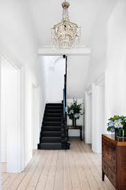 Renovating an historic home takes careful consideration, according to the national trust for the frederick historic district guidelines for renovation can be found on the city of frederick website. Natural Wood Floors Mixed With White Walls And Black Staircase In This Historic Australian Home Renovation By Sjb Black Staircase Home White Walls