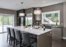 Olive green cabinetry is the perfect match for this glossy subway tile in a design by michele plachter design. Choosing A Stunning Backsplash For Your Kitchen Neil Kelly