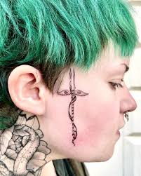 Image result for quirky pylon forehead tattoo