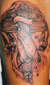 There is a dove underneath the praying hands. Cross Tattoo For Hand Novocom Top