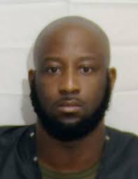 Four Charged in Credit Card Scheme