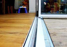 Internal Level Threshold For A Bi Fold Door With A White Cill With A Gully Drain To The Front Bifold Patio Doors Bifold Doors Folding Patio Doors