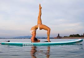 12 Amazing Paddleboard Yoga Poses And How To Do Them Livestrong Com Paddle Board Yoga Paddle Boarding Standup Paddle