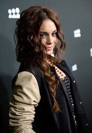 The side braid is a cute style of braiding that goes over the shoulder. Curly Hair Ideas Vanessa Hudgens Loose Side Braid Hair Ideas Livingly