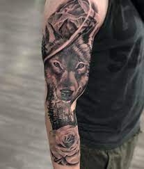 Wolf Wilderness With White Rose Tattoo Designed And Done By Lud Bradley Of Third Eye Tattoo New We Rose Tattoos For Women Third Eye Tattoos White Rose Tattoos