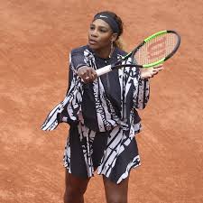 Nike shoes of serena williams of usa with two slogans printed on them: Serena Williams S Custom Off White Outfit At The French Open Sent A Message Vogue