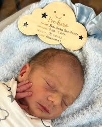 Our sweet baby boy Beau Charles Dean Miller arrived yesterday morning at  11:12 am and weighed a huge 4 pounds 7.6 oz. Beau is healthy and a very  sleepy boy. We love