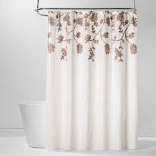 This shower curtain features an allover print of birds perched on branches with multicolor floral accents on a white background to bring the beauty of outdoors into any bathroom. Floral Embroidered Shower Curtain Off White Threshold White Shower Curtain Shower Curtain Floral Shower Curtains