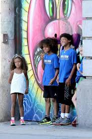 Download u2 song 'invisible' to fight against aids! Heidi Klum S Kids Pose For Photos Outside Of Their Apartment Building In New York On June 18 2014 Heidi Klum S Children Heidi Klum Family Celebrity Moms