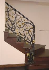 Replacing a wrought iron railing with a wood banister can update an outdated look. Branches With Leaves Stair Railing This Needs To Make It Into A Future Book Wrought Iron Railing Stair Railing Iron Staircase Railing