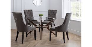 The tone of beige in your dining area may be significantly affected by your lighting. Chelsea Large Round Table And 4 Luxury Studded Velvet Veneto Dining Chairs The Place For Homes