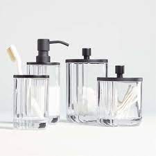 Best bathroom canisters are a great option for those who want to organize their bathroom without thrown all over the top of your bathroom vanity, they give the room an untidy room and deteriorate. Ribbed Glass Bath Accessories Crate And Barrel In 2021 Glass Soap Pump Modern Bathroom Accessories Glass Bathroom