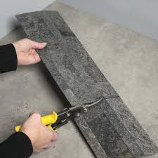 The backsplash uses squares in large or small sizes. Aspect 5 9 X 23 6 Peel Stick Stone Backsplash Tiles At Menards