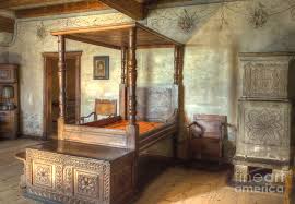 A bedroom between medieval and modern with a beautiful oversized chandelier. Medieval Bedroom Photograph By Michelle Meenawong