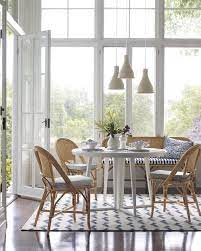 Find the perfect decorative accents at hayneedle, where you can buy online while you explore our room designs and curated looks for tips, ideas & inspiration to help you along the way. Natural Dining Chairs With Cushion In Breakfast Nook With White And Blue Rug Serena Lily Parisian Bistro Chairs Dining Room Decor Coastal Dining Room