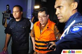 Direktur PT Citra Mandiri Metalindo Abadi (CMMA) Budi Susanto saat keluar dari Gedung KPK, ... - usai-diperiksa-9-jam-budi-susanto-langsung-dijebloskan-penjara-001-debby