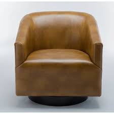 Expert craftsmanship makes charles a beautiful swivel chair the chair's distinctive, high back makes it easy to lounge and rest your head, while the aluminum swivel base enhances easy movement. Modern Contemporary Camel Leather Swivel Chair Allmodern